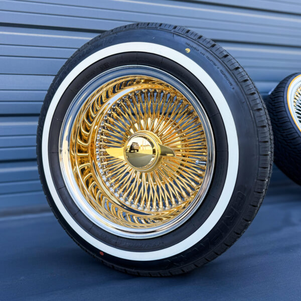14x7-gold-center-wire-wheels-and-whitewall-tires-side-view gold center with 2-bar knock-off mounted on whitewall tires