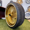 22x8" Gold Wire Wheels – 150 Spoke All Gold Standard Offset + Vogue Tires 265/35R22 (Set of 4)