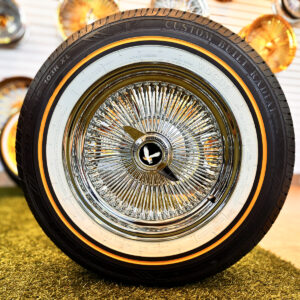 15x7-wire-wheels-100-spoke-standard-215-70-15-vogue-tires-black-eagle 15×7” 100-Spoke Chrome Wire Wheels + 215/70R15 Original Vogue Tires & Black Eagle front view