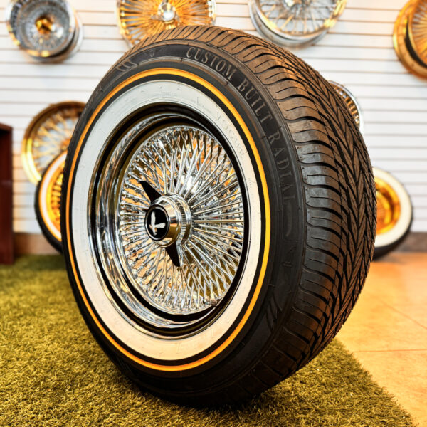 15×7” 100-Spoke Chrome Wire Wheels + 215/70R15 Original Vogue Tires & Black Eagle - side view 2