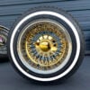 13x7 wire wheels gold nipple gold hub and gold knock-off with 155/80R13 whitewall tires