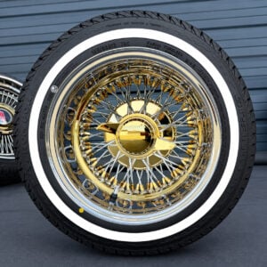 13x7-wire-wheels-72-spoke-cross-laced-gold-nipple-155-80-13-whitewall-and-yellow-stripe-tires 13x7 triple gold wire wheels with whitewall tire