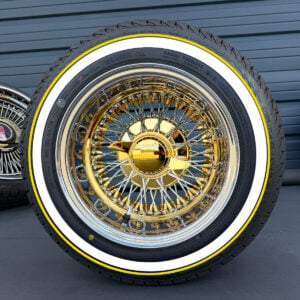 13x7 wire wheels gold nipple gold hub and gold knock-off with 155/80R13 vogue tires