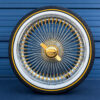 gold nipple, gold hub - wire wheel mounted on vogue tires