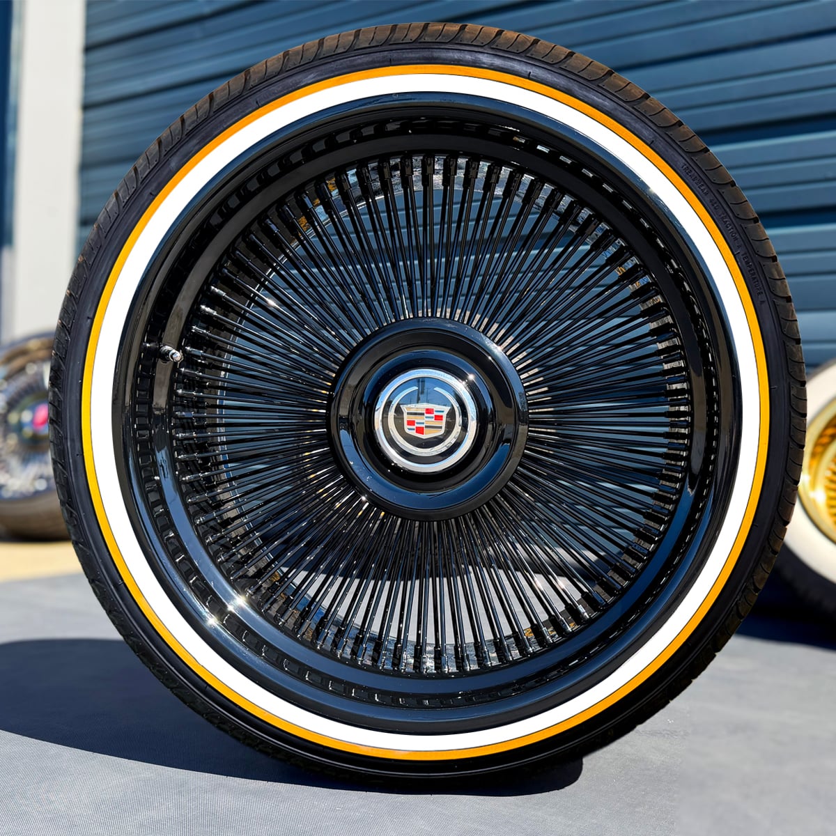 22-inch-wire-wheels-all-black-265-35-22-original-vogue-tires-front 22x9” All Black Alloy Wire Wheels + 255/30R22 Custom Red Stripe Tires – Bolt-On Floating Cap | Premium Black Powder Coat | Set of 4