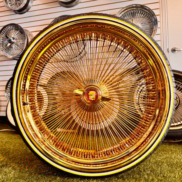 26-inch-wire-wheels-ninja-tire-275-25-26-white-gold-stripe-tires-front-2 26” Gold Wire Wheels – 26x9 / 26x10 Staggered + 275/25R26 True Whitewall & Yellow Stripe Tires | 6” Lip Rear | Cadillac Donk Setup