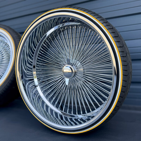 26" wire wheels deep dish reverse offset chrome with 275/25R26 custom whitewall and yellow stripe tires