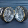26" wire wheels staggered chrome 26x9 and 26x10 with 275/25R26 custom whitewall and yellow stripe tires