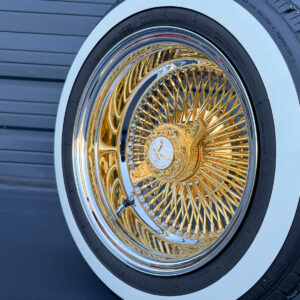 14x7-inch-wire-wheels-real-24k-california-gold-center-with-chrome-lip-and-true-whitewall-tires-close-up 14x7" gold wire wheels real 24k california gold + engraved knock-off and whitewall tires