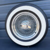 15x7-standard-chrome-wire-wheels-100-spoke-with-215-70-15-with-three-inch-whitewall-tires-front-view 15x7 standard wire wheels mounted on a 2.5" thick whitewall