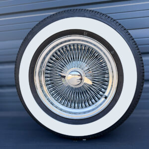 15x7-standard-chrome-wire-wheels-100-spoke-with-215-70-15-with-three-inch-whitewall-tires-front-view 15x7 standard wire wheels mounted on a 2.5" thick whitewall
