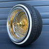 17x9-reverse-gold-center-100-spoke-wire-wheels-with-205-45-17-custom-true-whitewall-tires 17x9 deep dish reverse wire wheel showing 24k gold hub and nipples, and gold spokes