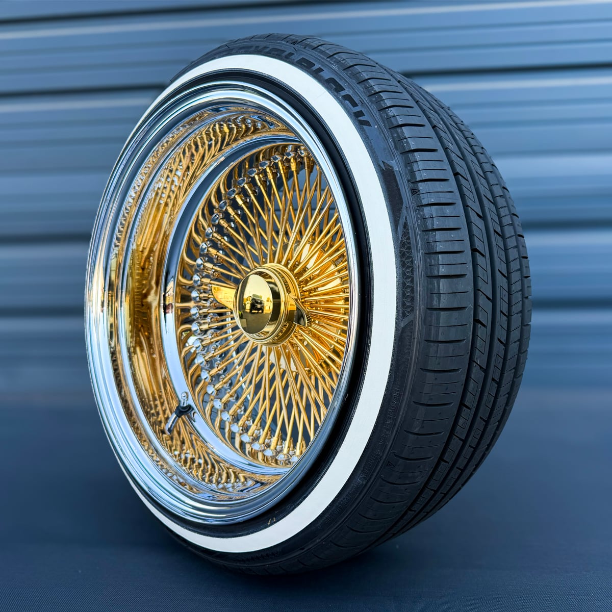 17x9-reverse-gold-center-100-spoke-wire-wheels-with-205-45-17-custom-true-whitewall-tires 17x9 deep dish reverse wire wheel showing 24k gold hub and nipples, and gold spokes