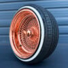 17x9-reverse-rose-gold-100-spoke-wire-wheels-with-205-45-17-custom-true-whitewall-tires-side-view 17x9 reverse wire wheels rose gold finish mounted on whitewall tires