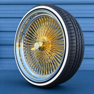 22-inch-standard-wire-wheels-gold-center-255-30-r22-custom-whitewall-tires-side-view-2 Gold center wire wheels mounted on a whitewall tire