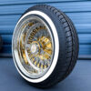 13x7-triple-gold-reverse-72-spoke-cross-lace-cali-spoke-diamond-cut-and-whitewall-tire-set-side-view 13x7 Reverse Triple Gold 72-Spoke Diamond-Cut Cali Wire Wheels & Whitewall Tires