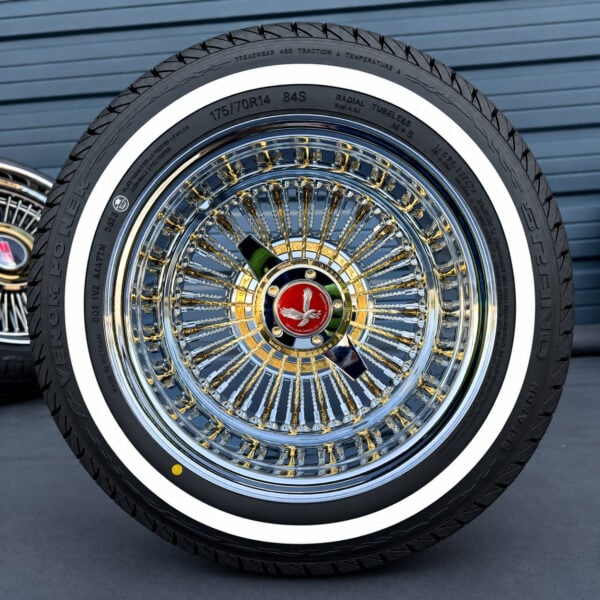 14x7 reverse with gold and chrome spoke and red eagle chip