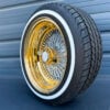 15x7-reverse-chrome-and-gold-diamond-cut-wire-wheels-100-spoke-cross-lace-with-whitewall-tires-side-view-eagle 15x7 Reverse 100 spokes diamond cut and whitewall tire