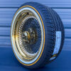 20x8-black-and-gold-wire-wheels-150-spoke-and-vogue-tire-set-side-view 20x8 black wire wheels with gold lip and vogue tire package