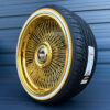22x9-wire-wheels-bolt-on-floating-cap-265-35-22-whitewall-gold-stripe-original-vogue-brand-tires-side-with-cadillac-floating-cap 22x9 Forged All-Gold Direct Bolt Wire Wheels & Vogue Tires Set