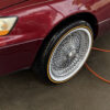 Lexus ES 300 on 17-inch chrome wire wheels with white and gold stripe Vogue Tires