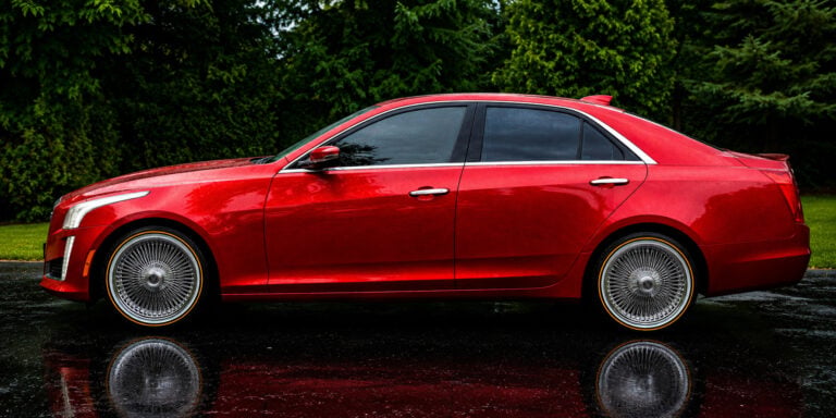 2015 Cadillac CTS on 20x8 chrome 150-spoke wire wheels