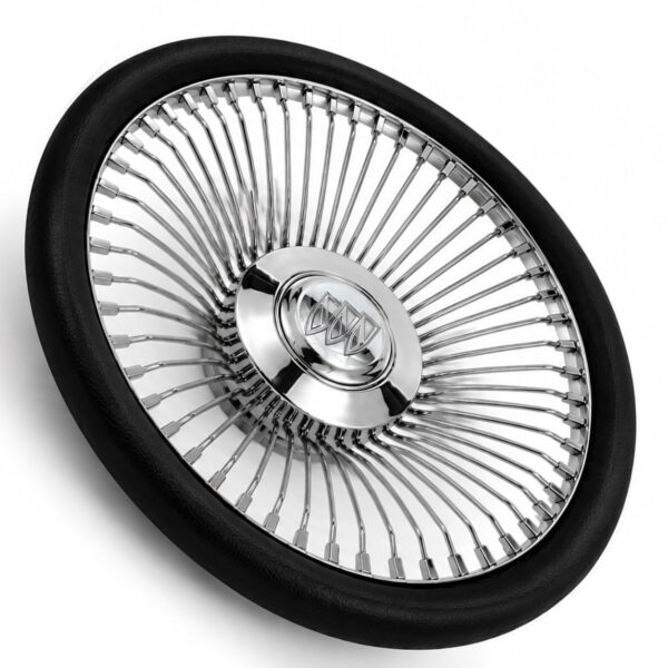 buick-chrome-spoke-steering-wheel-black-grip-angle-view Angled view of Buick 64-spoke chrome wire steering wheel showing triple-plated chrome spokes and engraved emblem