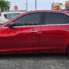 Cadillac CTS on 150-spoke chrome wire wheels with 245/40R20 Vogue Tires